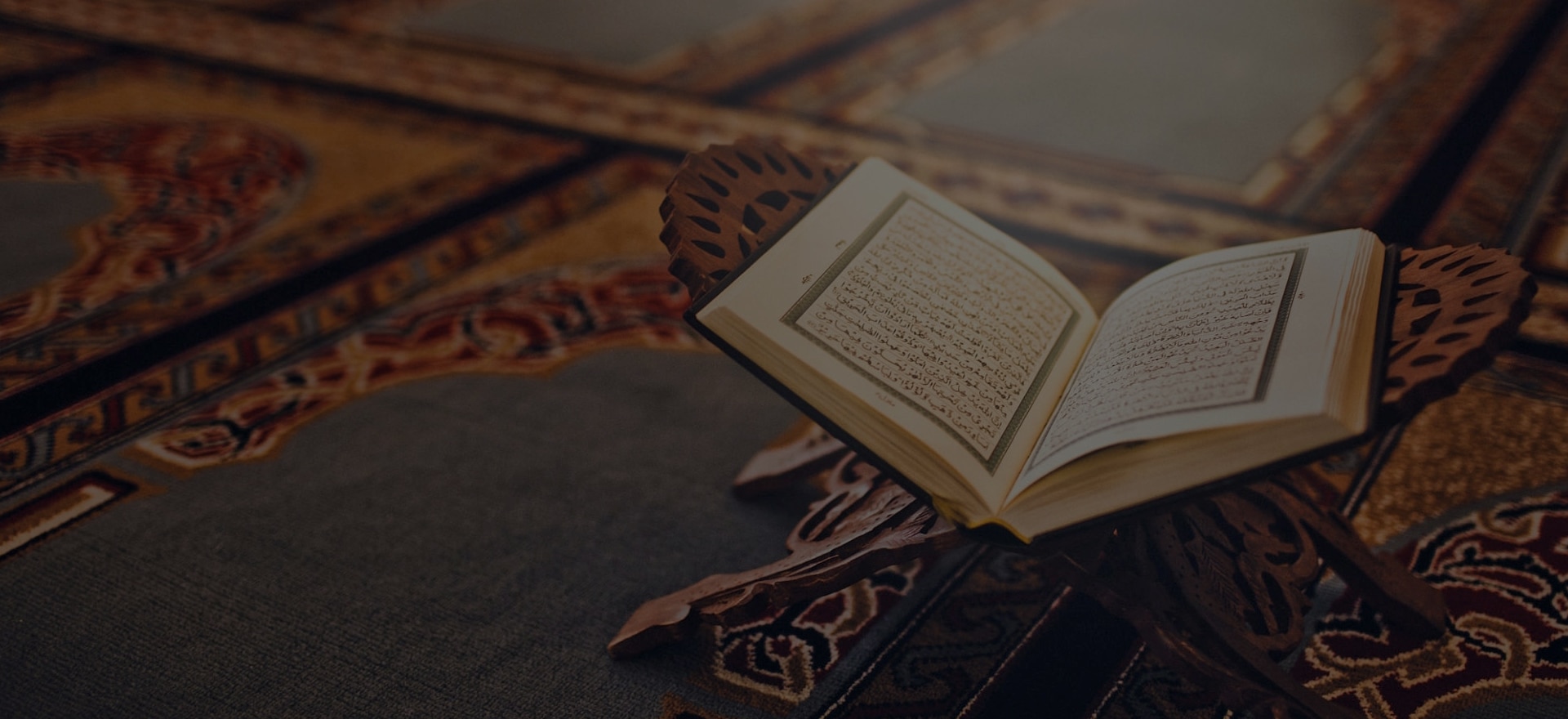 469201837-Quran-open-on-stand-near-mosque-floor.jpg